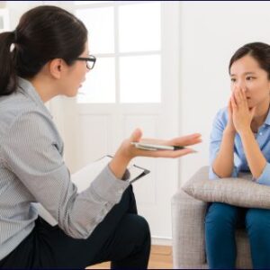 Person talking with counsellor for Body-Oriented Trauma Counselling Strategies