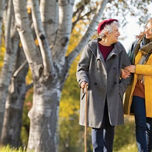 Image of two people supporting each other