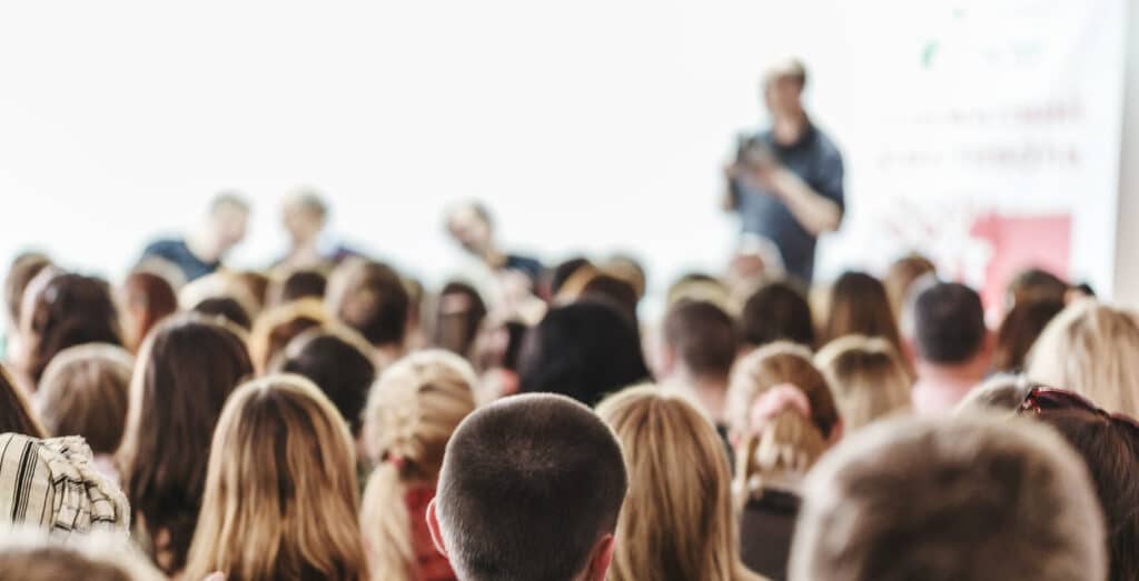 Photo of a workshop listening to trainer